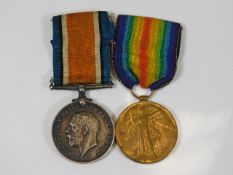 A pair of WW1 medals awarded to 27054 Pte P. Bridg