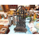 A cast iron stick stand 20.5in tall