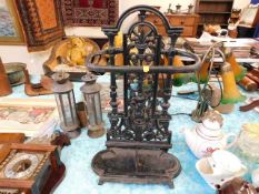 A cast iron stick stand 20.5in tall
