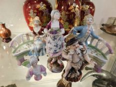 Four German porcelain figures & a half doll