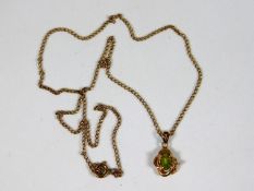 A 9ct gold necklace & pendant set with peridot & d