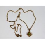 A 9ct gold necklace & pendant set with peridot & d