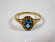 A 9ct gold ring set with topaz size N 1.4g