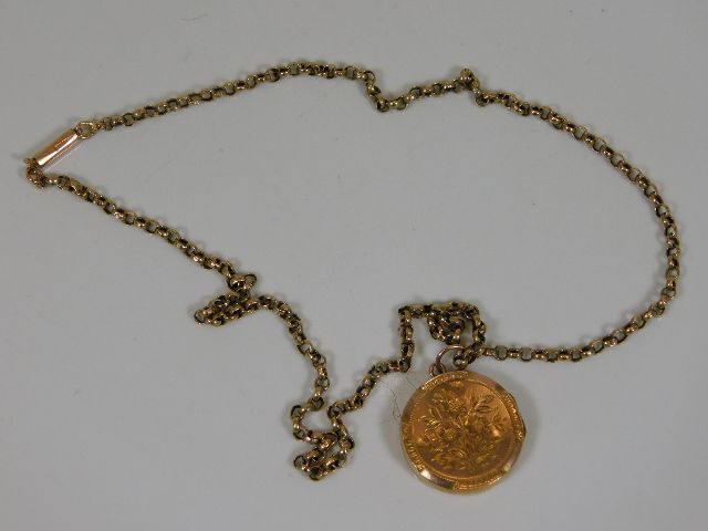 An 18in 9ct gold chain & yellow metal pendant 6.3g