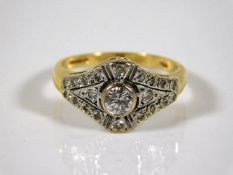 An early 20thC. 18ct gold ring set with diamonds s