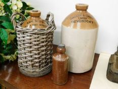 Two Devonport stoneware bottles & one other