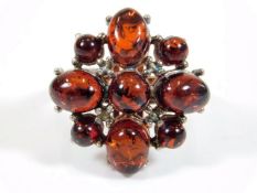 A sterling silver ring set with amber O/M 6.7g