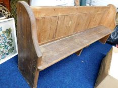 A seven foot long pine church pew