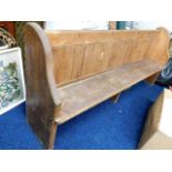 A seven foot long pine church pew