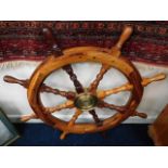 A mixed wood boat style wheel 34in diameter