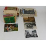 A quantity of European postcards & other items