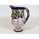 A c.1900 French faience puzzle jug signed PB 6.25I