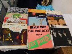 A quantity of vinyl LP's including Sex Pistols, Ro