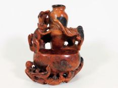 An Oriental soapstone carving 5.875in high