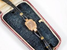 A ladies Marvin art deco 14ct gold watch with case