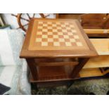 Two modern occasional tables, one with chess marqu