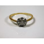 An 18ct gold daisy ring set with 0.5ct diamonds si