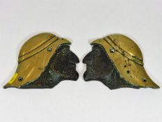 A pair of early 20thC. bronze arab head plaques re