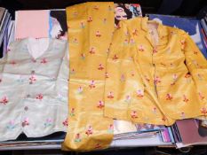 Two Nepalese silk outfits that once belonged to a
