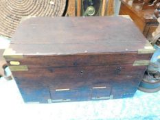 A brass bound antique box lacking contents