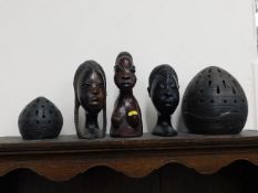Three modern African carvings & two candle holders