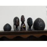 Three modern African carvings & two candle holders