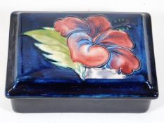 A Moorcroft hibiscus box & cover with Potters to Q