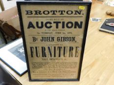 A framed 19thC. auction poster