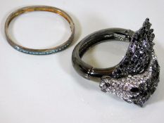 A bespoke costume jewellery bangle of horse twinne