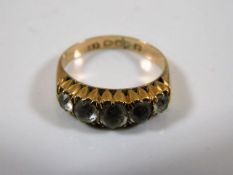 A 9ct gold ring with paste stones size K 2.3g