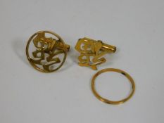 A pair of 14ct gold cufflinks with decorative Orie