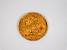 A 1905 22ct full gold sovereign