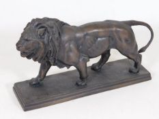A Franklin Mint bronze lion signed Barye 9.5in lon