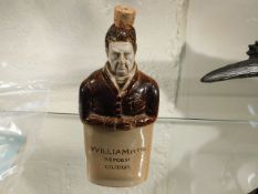 A stoneware William IV cordial bottle
