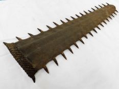A 19thC. sawfish rostrum with Aboriginal binding 28in long
