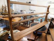 An Ercol elm plate rack