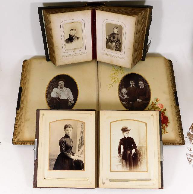 Three antique photo albums including military