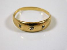 An 18ct gold ring set with diamond size 2.5g O/M