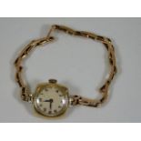 A ladies 9ct gold watch & strap 10.9g