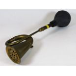 A brass car horn, working order