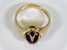 A 9ct gold masonic enamelled swivel top ring size