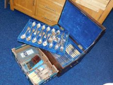 A 19thC. brass bound chest with trays of plated fl