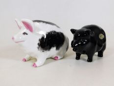 A Wemyss pig twinned with a Sylvac money bank