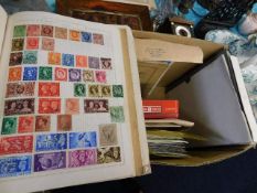 A stamp album & related items