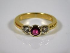 A yellow metal, tests at 18ct, ruby & diamond ring