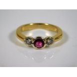 A yellow metal, tests at 18ct, ruby & diamond ring