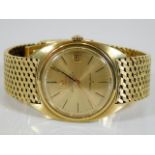 An 18ct gold Omega Constellation automatic Chronometer watch 126.4g, small crack to glass, runs very