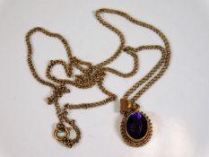A 9ct gold necklace & pendant set with amethyst 4.