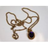 A 9ct gold necklace & pendant set with amethyst 4.