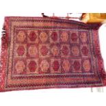 A Persian Bokhara style rug 71in x 50in